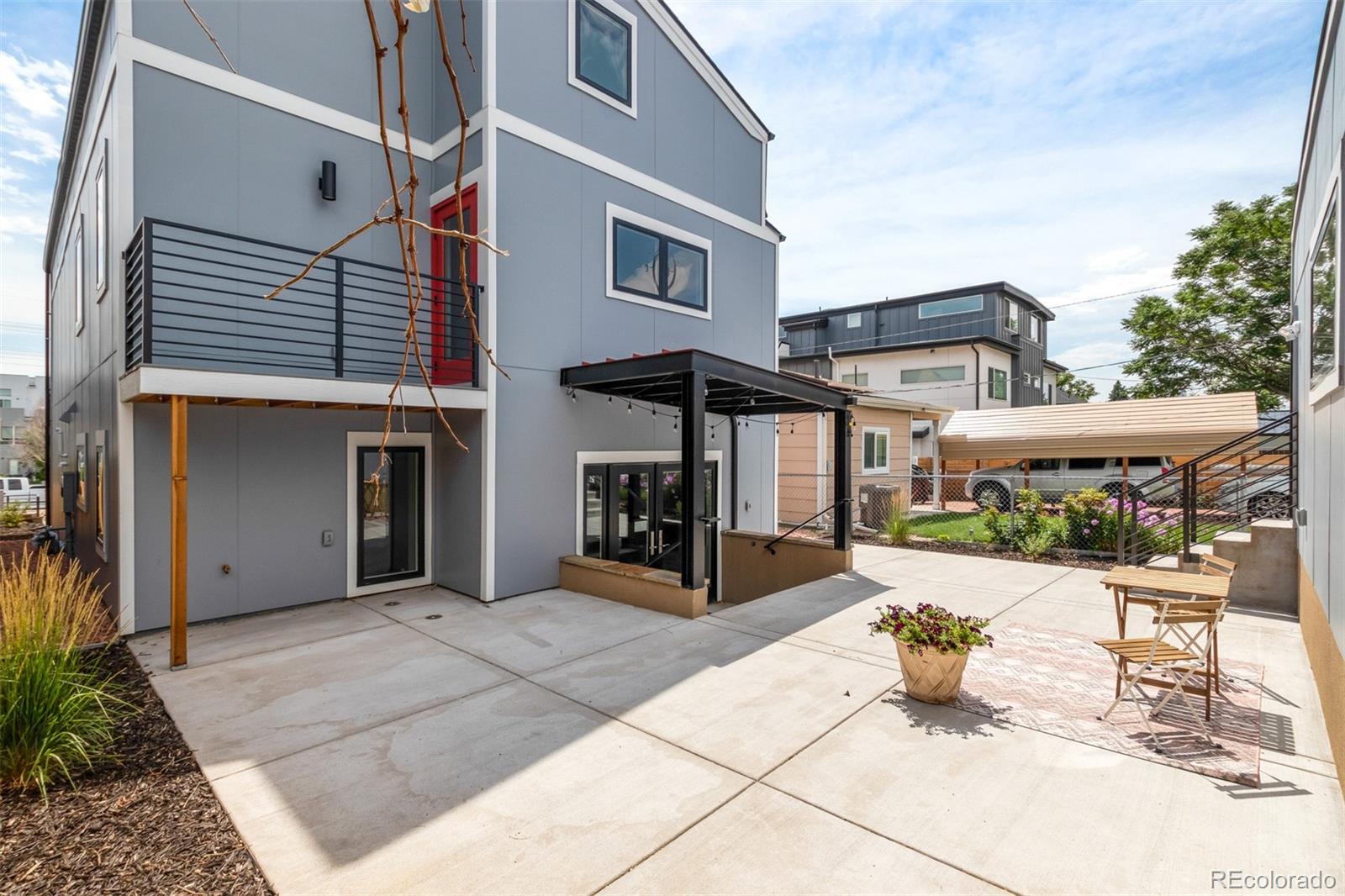3935 Jason Street Denver, CO 80211 - Photo 31 of 34 a front view of a building with sitting area