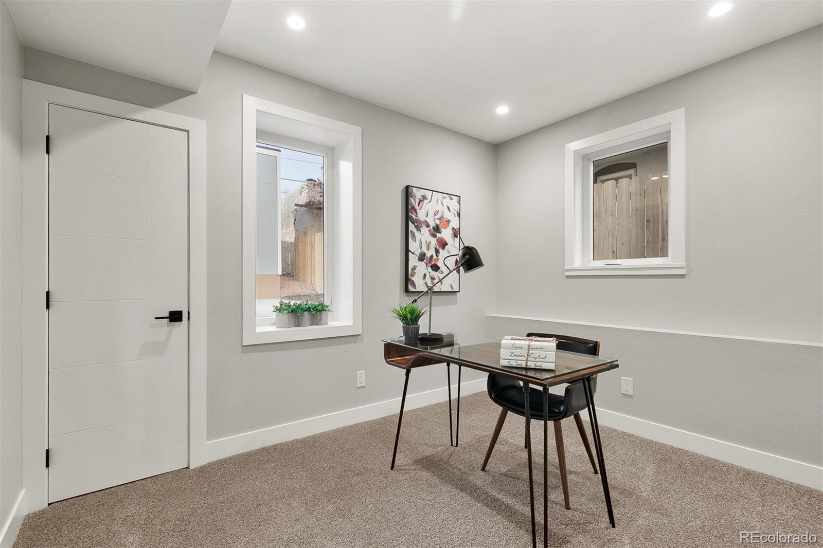 3935 Jason Street Denver, CO 80211 - Photo 9 of 34 a workspace with furniture and window