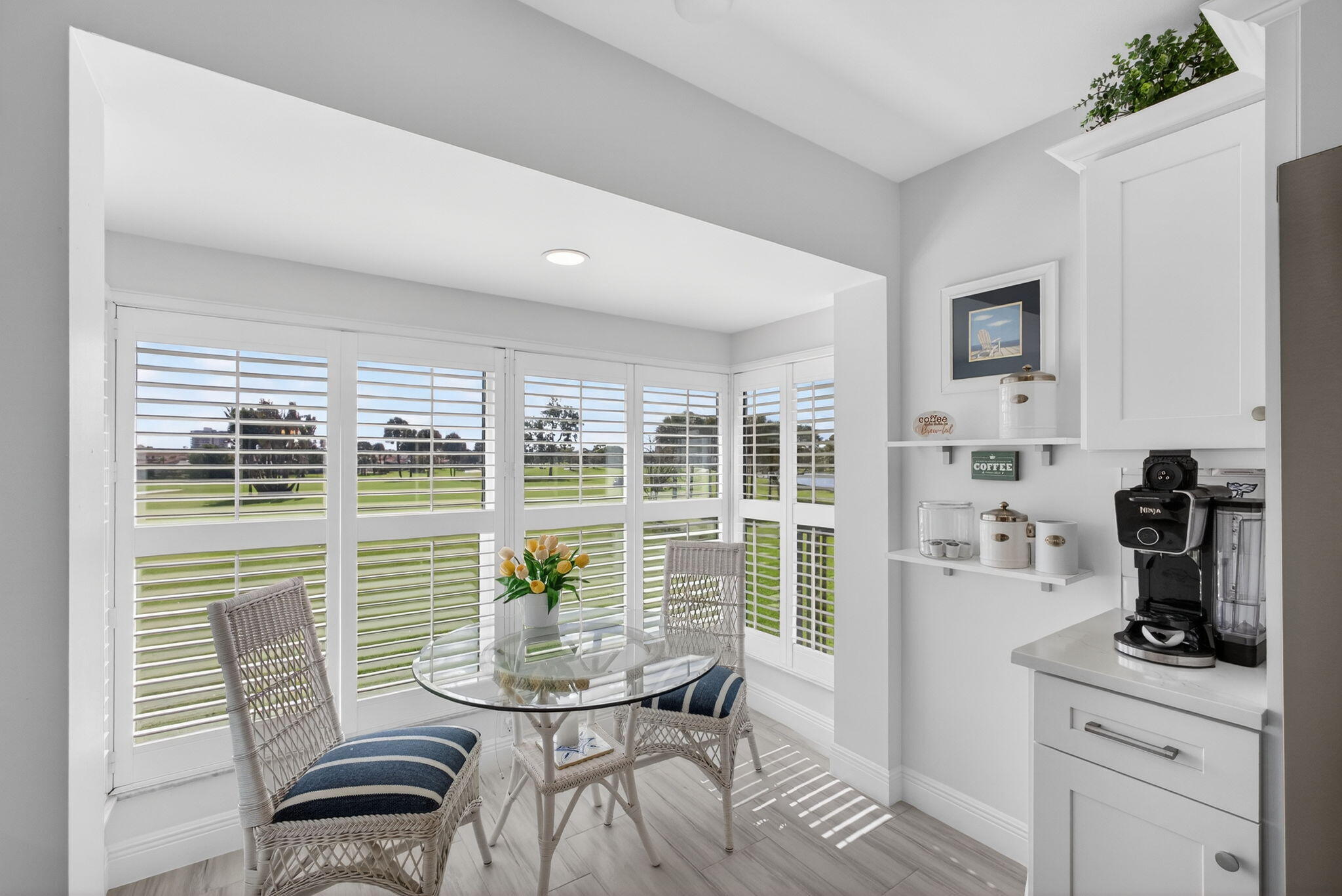 16550 Traders Crossing South, Unit 248 Jupiter, FL 33477 - Photo 15 of 50 a view of a dining room with furniture window and outside view