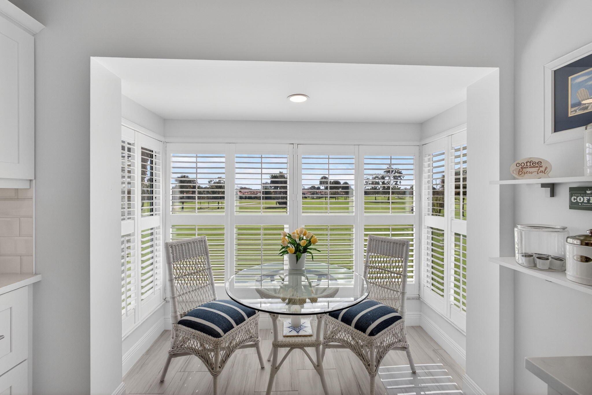 16550 Traders Crossing South, Unit 248 Jupiter, FL 33477 - Photo 16 of 50 a view of a dining room with furniture window and outside view