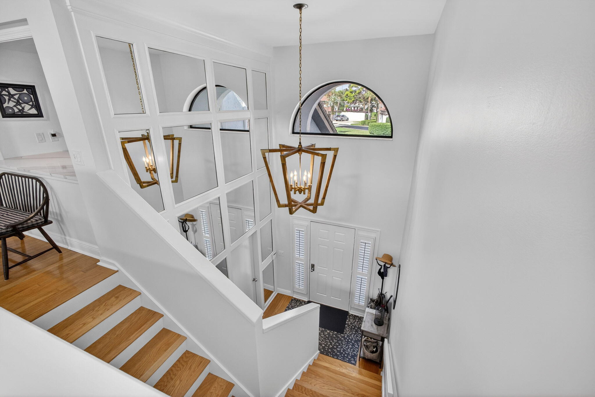 16550 Traders Crossing South, Unit 248 Jupiter, FL 33477 - Photo 2 of 50 a view of an entryway with wooden floor