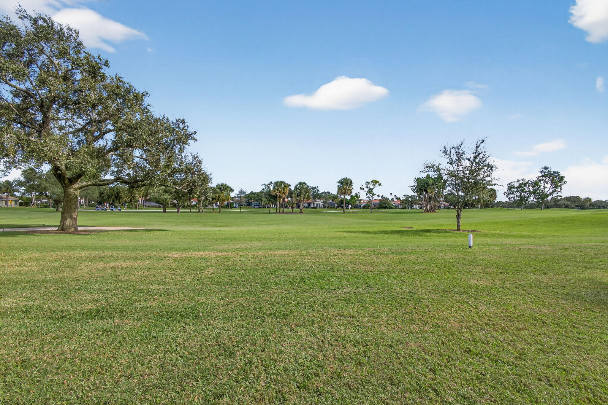 16550 Traders Crossing South, Unit 248 Jupiter, FL 33477 - Photo 44 of 50 a view of a golf course