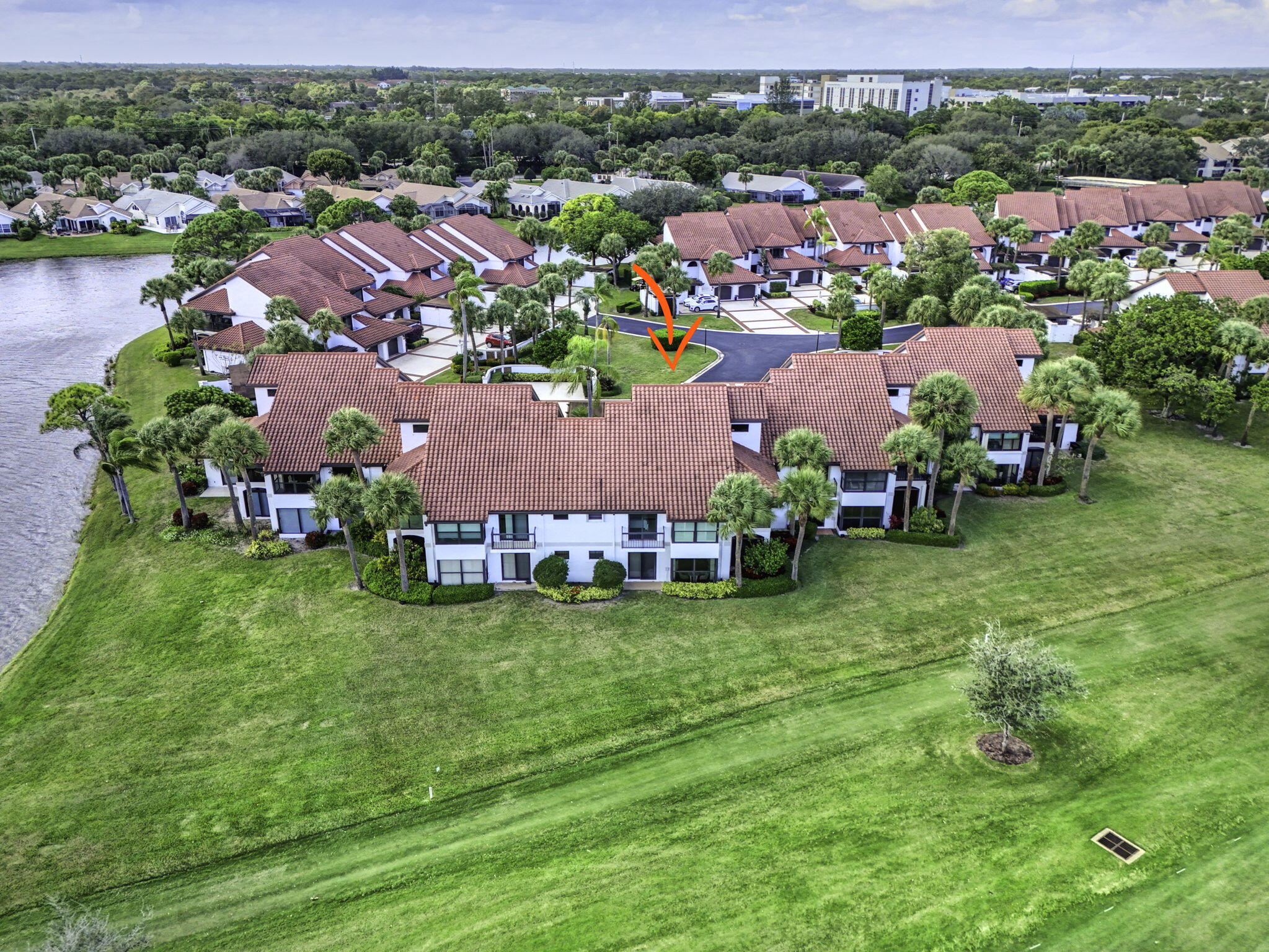 16550 Traders Crossing South, Unit 248 Jupiter, FL 33477 - Photo 50 of 50 an aerial view of residential houses with outdoor space and lake view