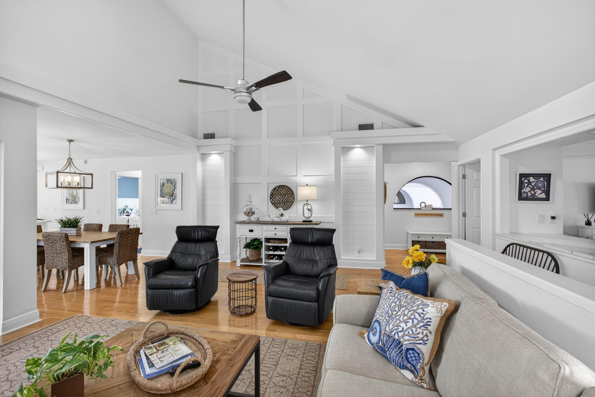 16550 Traders Crossing South, Unit 248 Jupiter, FL 33477 - Photo 7 of 50 a living room with furniture and a chandelier