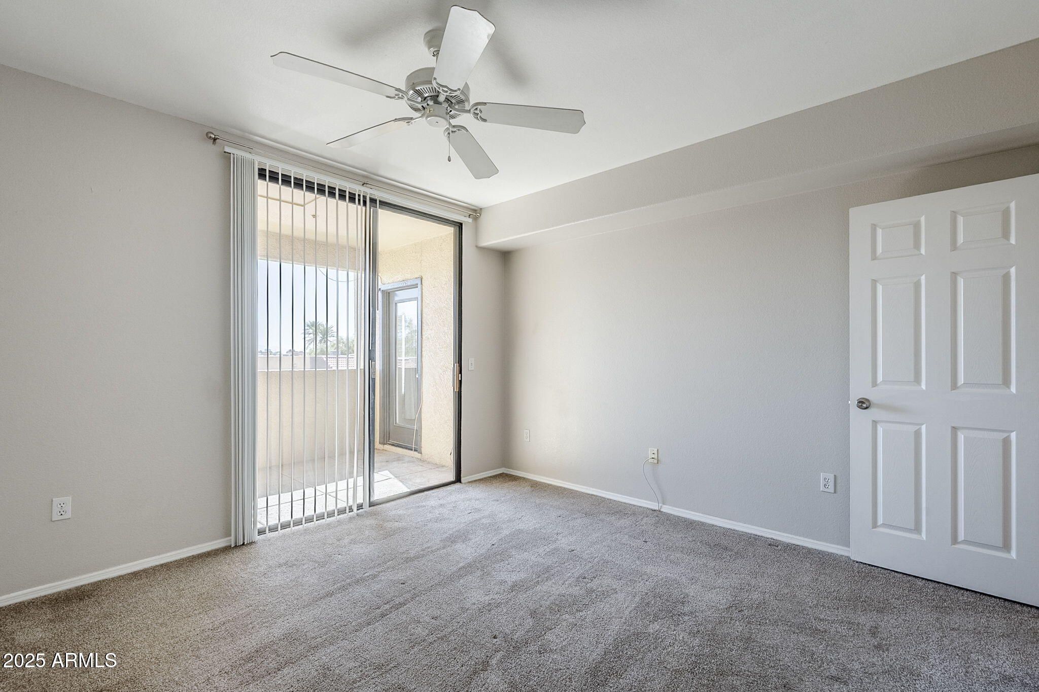4925 East Desert Cove Avenue, Unit 326 Scottsdale, AZ 85254 - Photo 17 of 37 a view of an empty room with a window