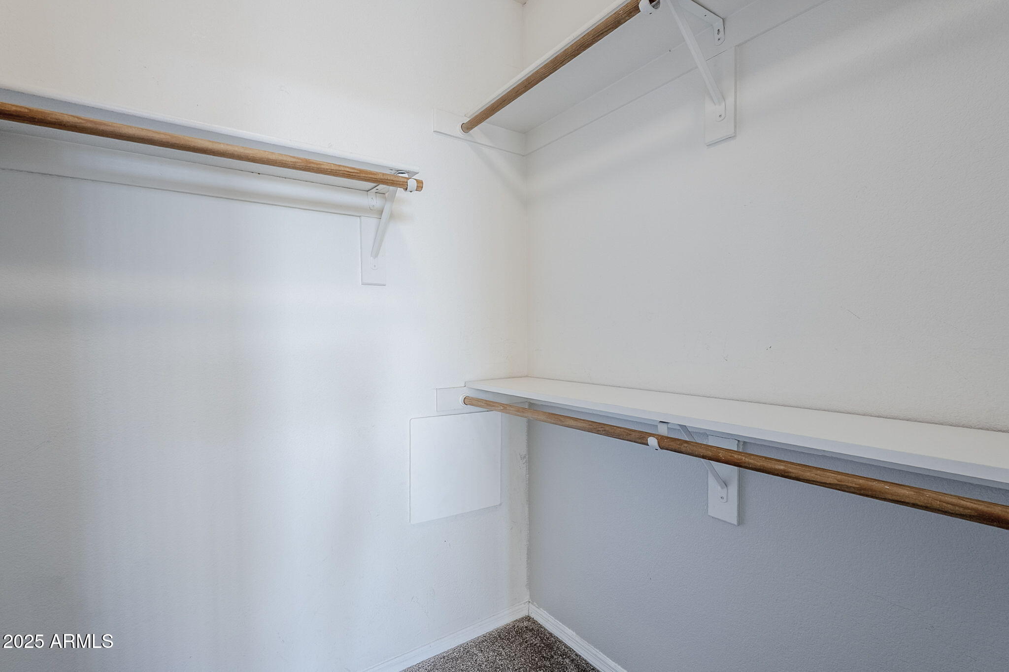 4925 East Desert Cove Avenue, Unit 326 Scottsdale, AZ 85254 - Photo 18 of 37 a close up view of racks on the wall