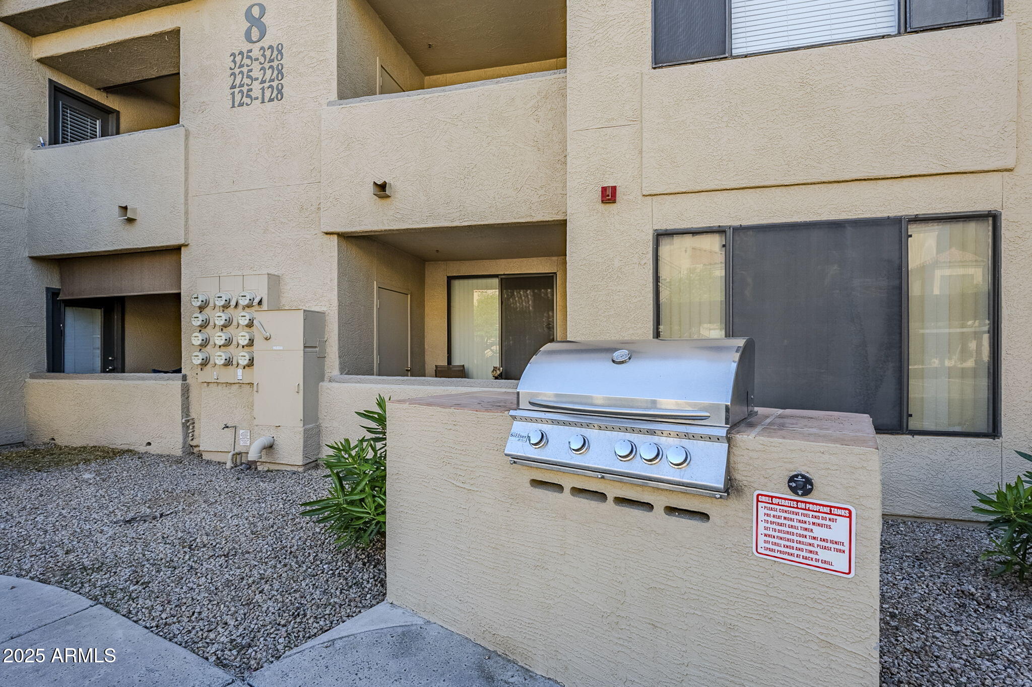 4925 East Desert Cove Avenue, Unit 326 Scottsdale, AZ 85254 - Photo 24 of 37 a view of kitchen with washer and dryer