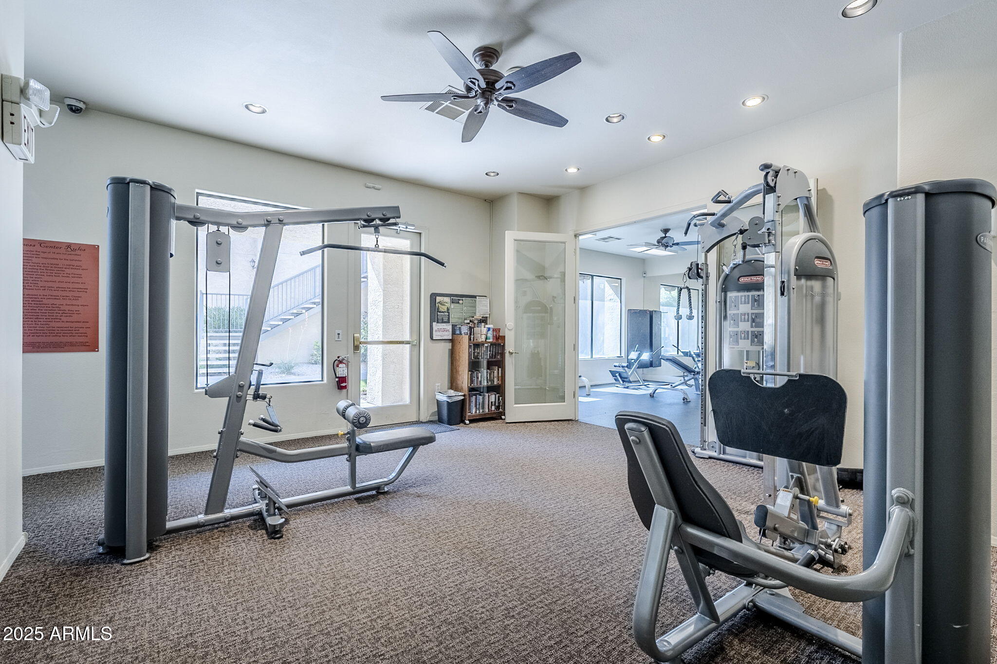 4925 East Desert Cove Avenue, Unit 326 Scottsdale, AZ 85254 - Photo 29 of 37 a living room with furniture and a chandelier