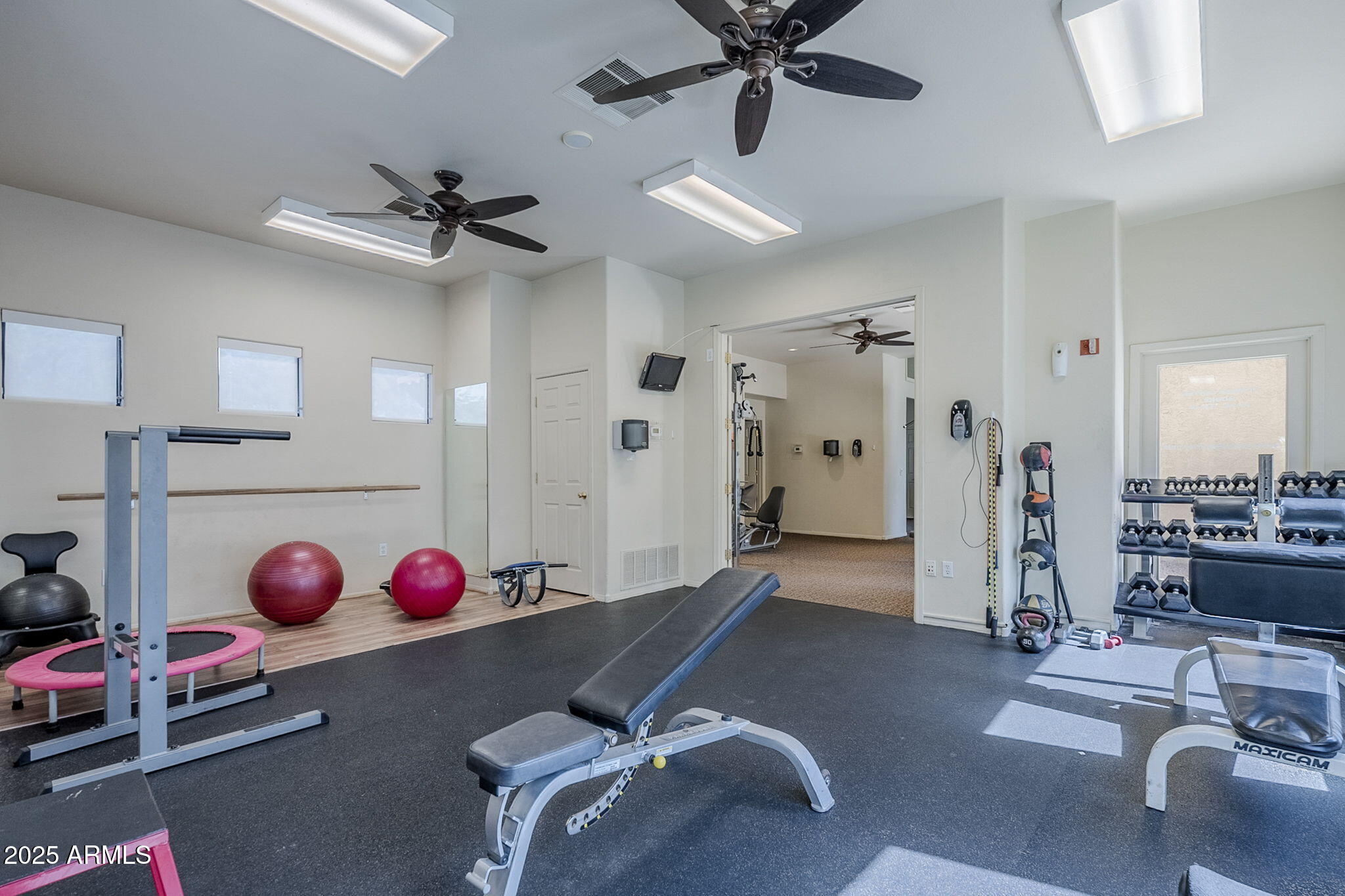 4925 East Desert Cove Avenue, Unit 326 Scottsdale, AZ 85254 - Photo 31 of 37 a view of a room with gym equipment