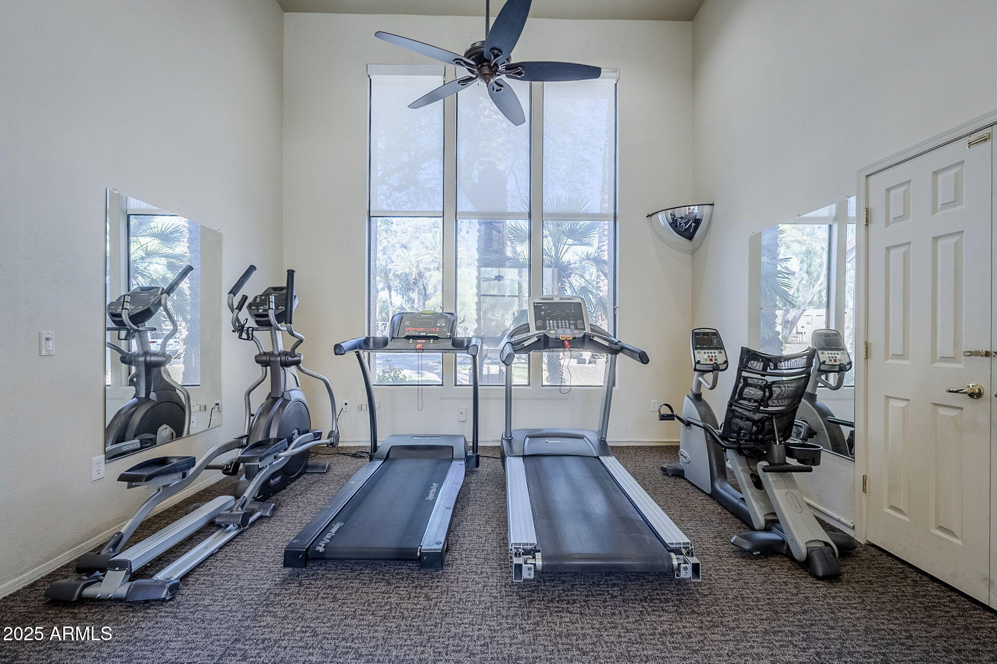4925 East Desert Cove Avenue, Unit 326 Scottsdale, AZ 85254 - Photo 32 of 37 a view of a room with gym equipment