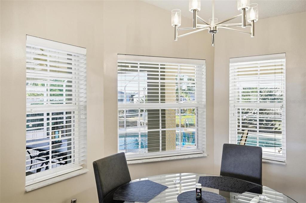 2 Cher Court Palm Coast, FL 32137 - Photo 15 of 64 a view of a livingroom with workspace and a window