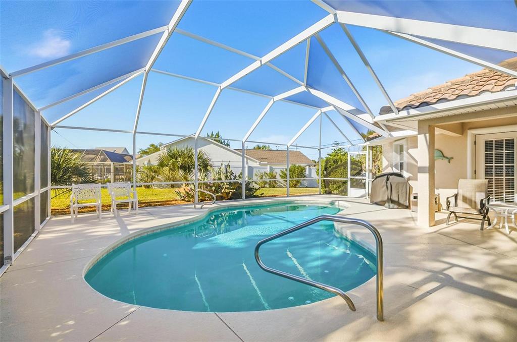 2 Cher Court Palm Coast, FL 32137 - Photo 25 of 64 a view of a swimming pool with an outdoor seating