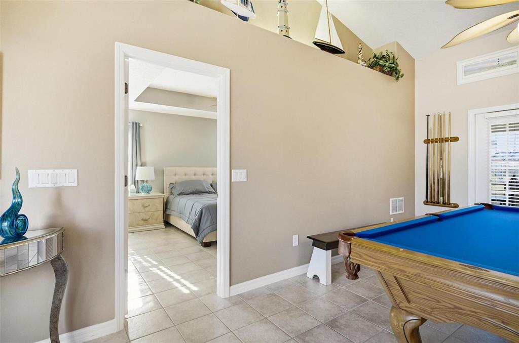 2 Cher Court Palm Coast, FL 32137 - Photo 33 of 64 a room that has a bed and a view of bedroom