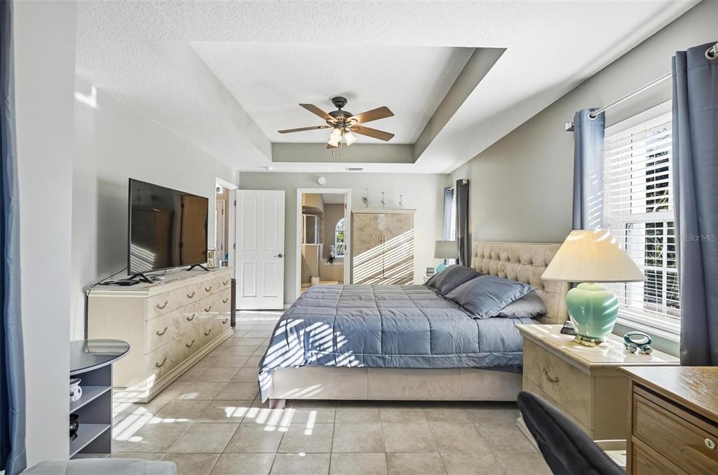 2 Cher Court Palm Coast, FL 32137 - Photo 36 of 64 a living room with furniture and a flat screen tv