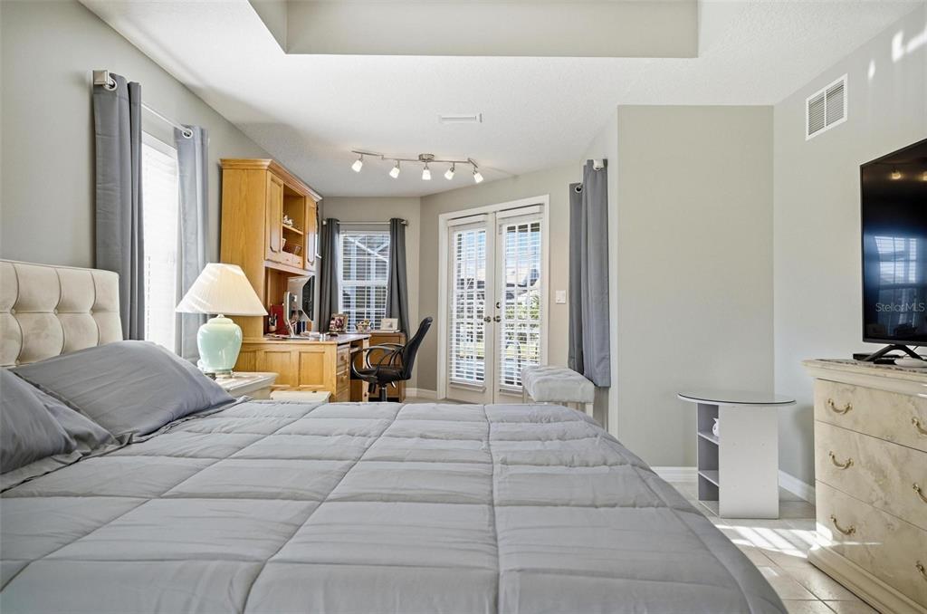 2 Cher Court Palm Coast, FL 32137 - Photo 38 of 64 a living room with furniture and a flat screen tv