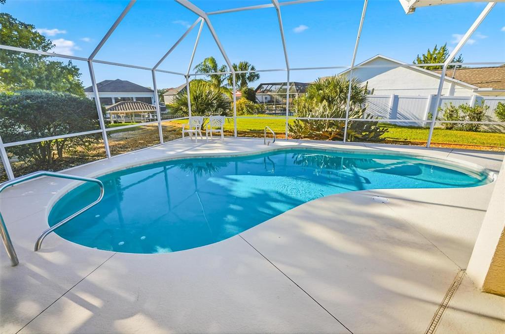 2 Cher Court Palm Coast, FL 32137 - Photo 40 of 64 a view of a swimming pool with a patio