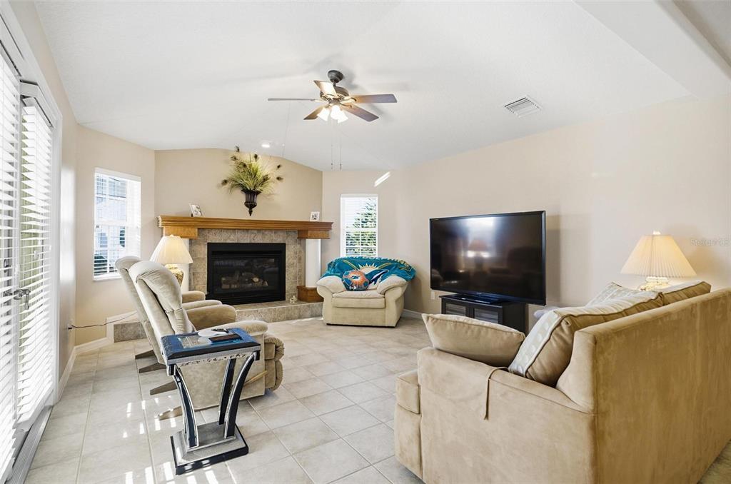 2 Cher Court Palm Coast, FL 32137 - Photo 48 of 64 a living room with furniture and a flat screen tv