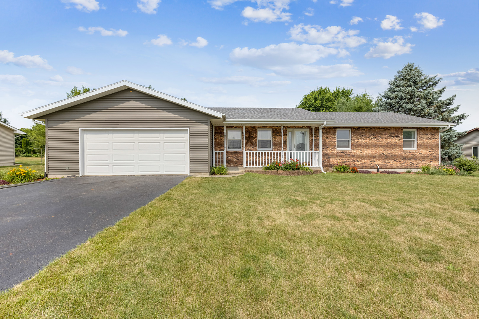 5394 South Mill Pond Road Rochelle, IL 61068 - Photo 1 of 28 a house view with a garden space