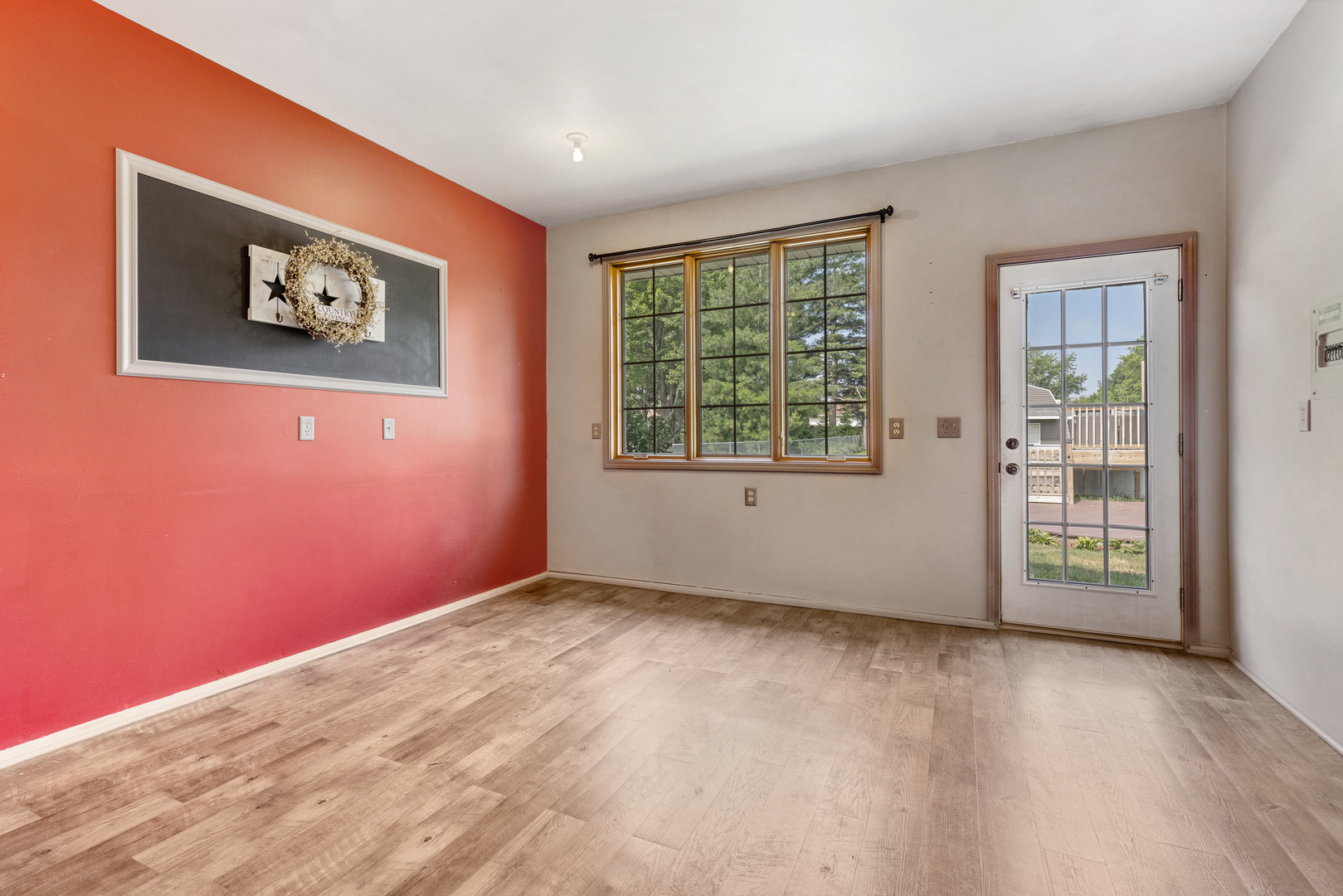 5394 South Mill Pond Road Rochelle, IL 61068 - Photo 14 of 28 a view of an empty room with a window and wooden floor