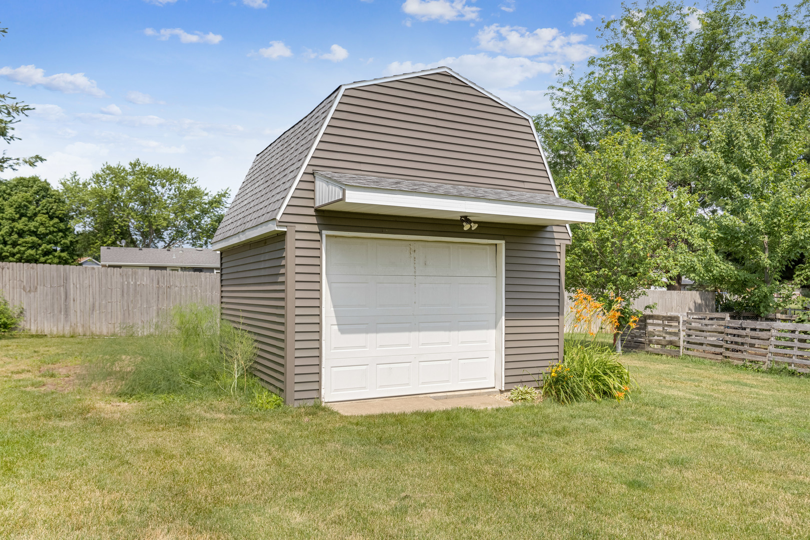 5394 South Mill Pond Road Rochelle, IL 61068 - Photo 25 of 28 a front view of a house with a yard