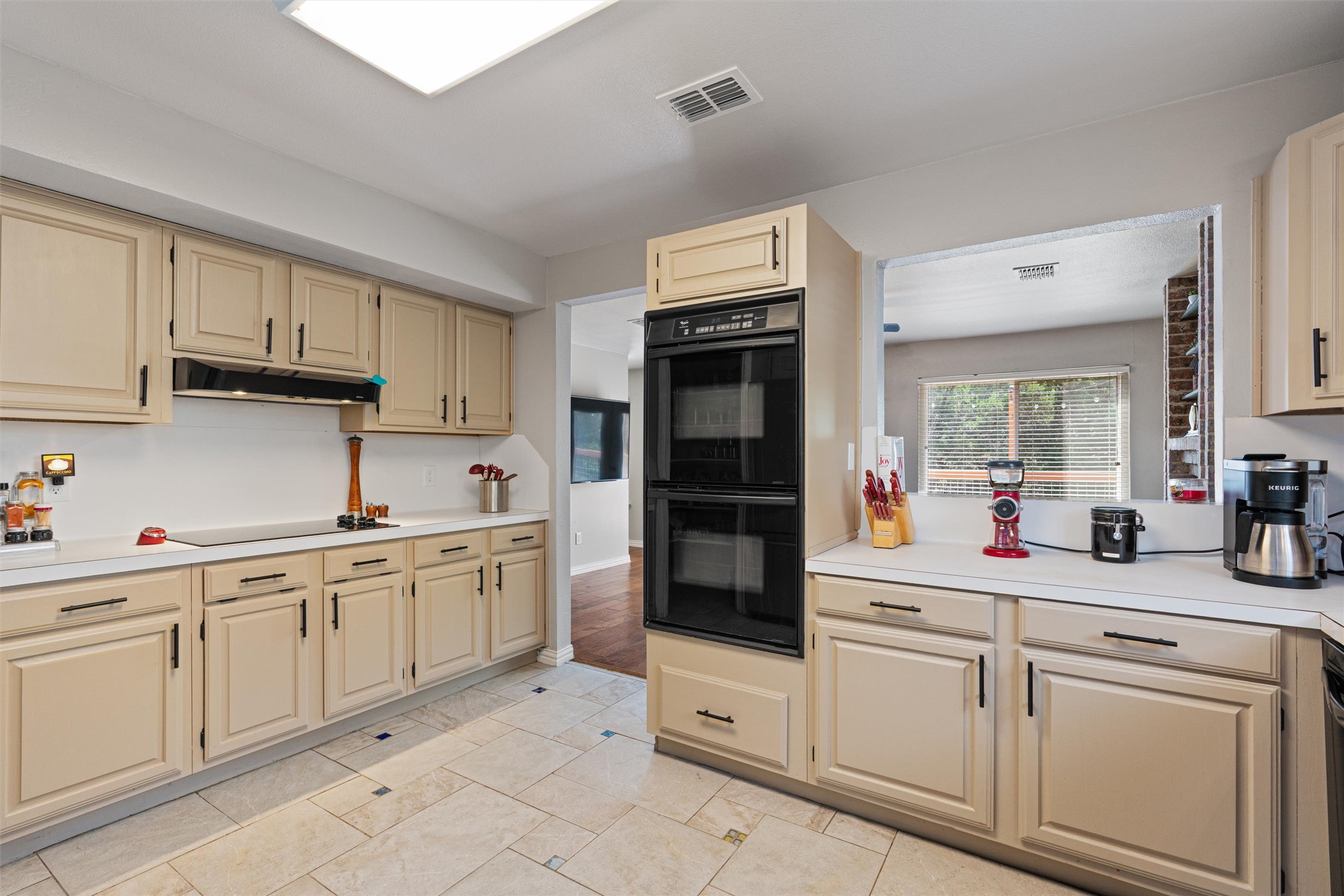 3011 Wadsworth Way Austin, TX 78748 - Photo 13 of 28 a kitchen with white cabinets and appliances