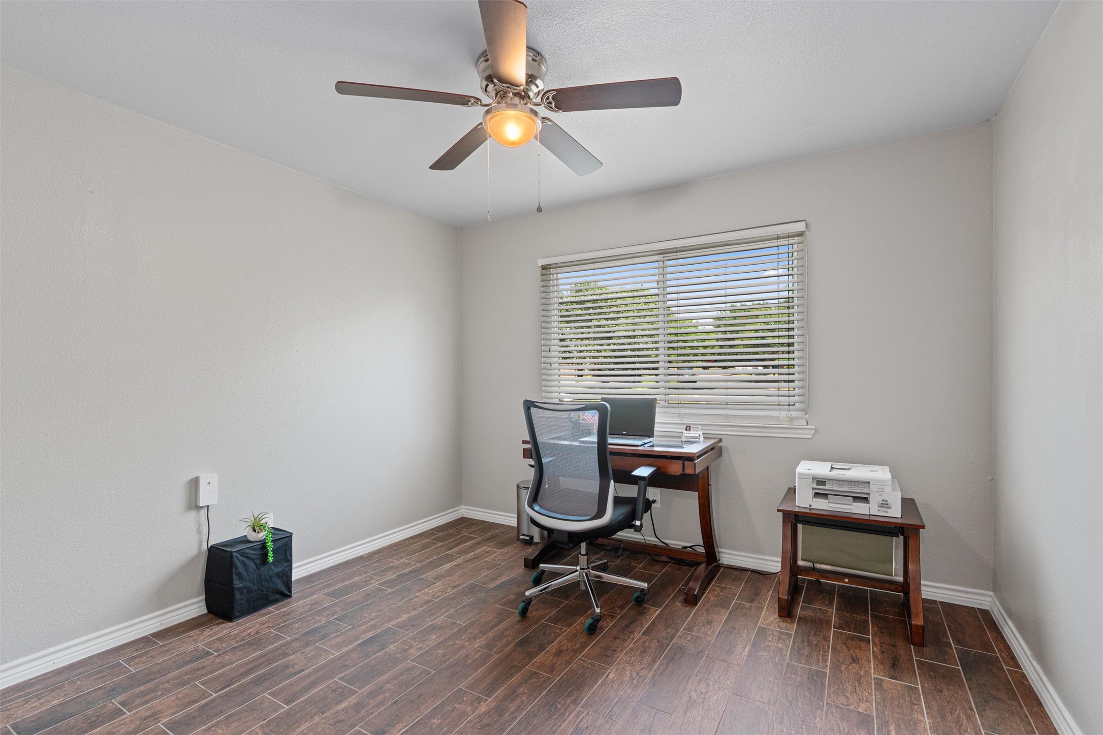 3011 Wadsworth Way Austin, TX 78748 - Photo 18 of 28 a view of a workspace with furniture and a window