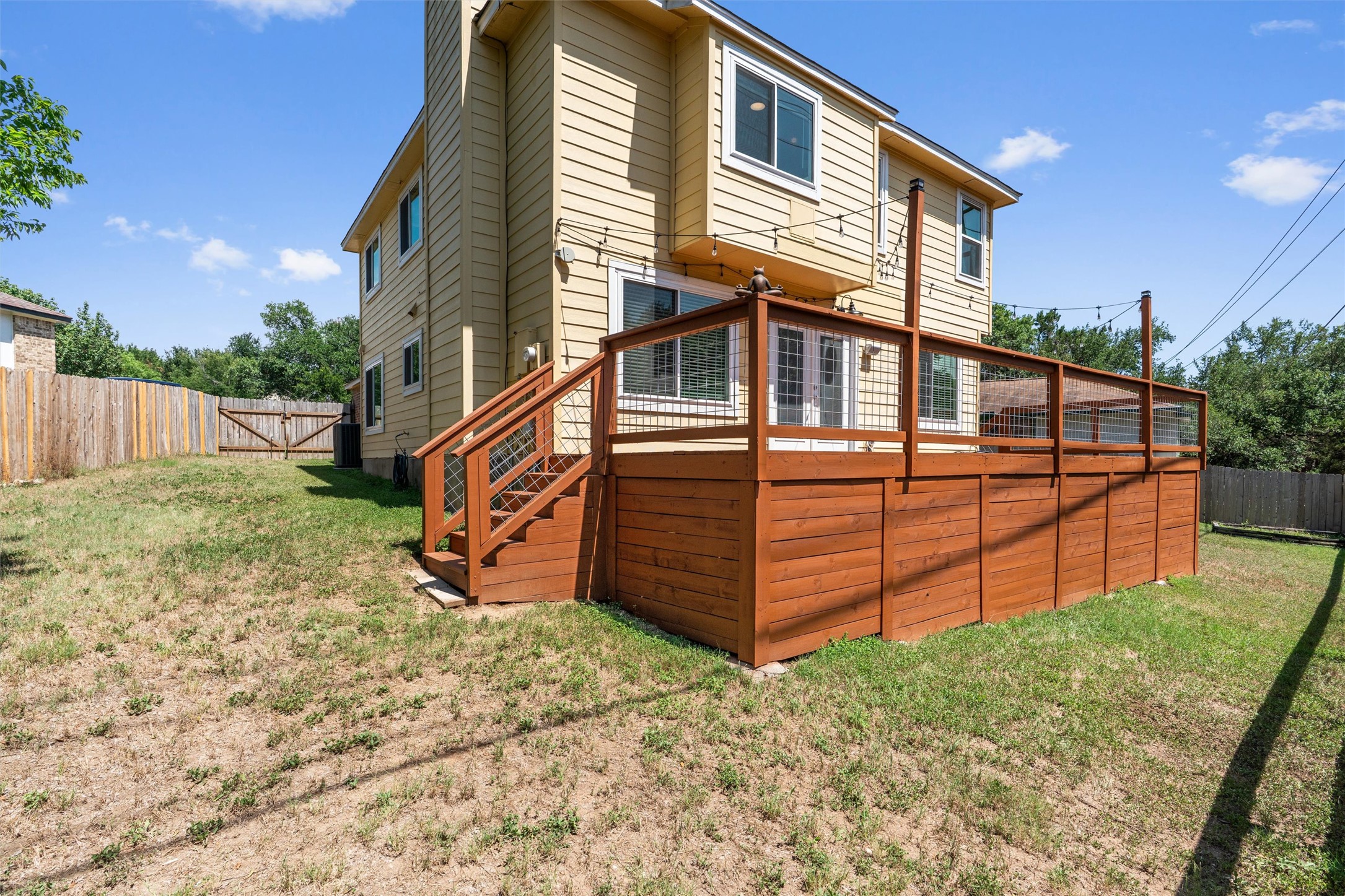 3011 Wadsworth Way Austin, TX 78748 - Photo 20 of 28 a view of a house with a yard and wooden fence