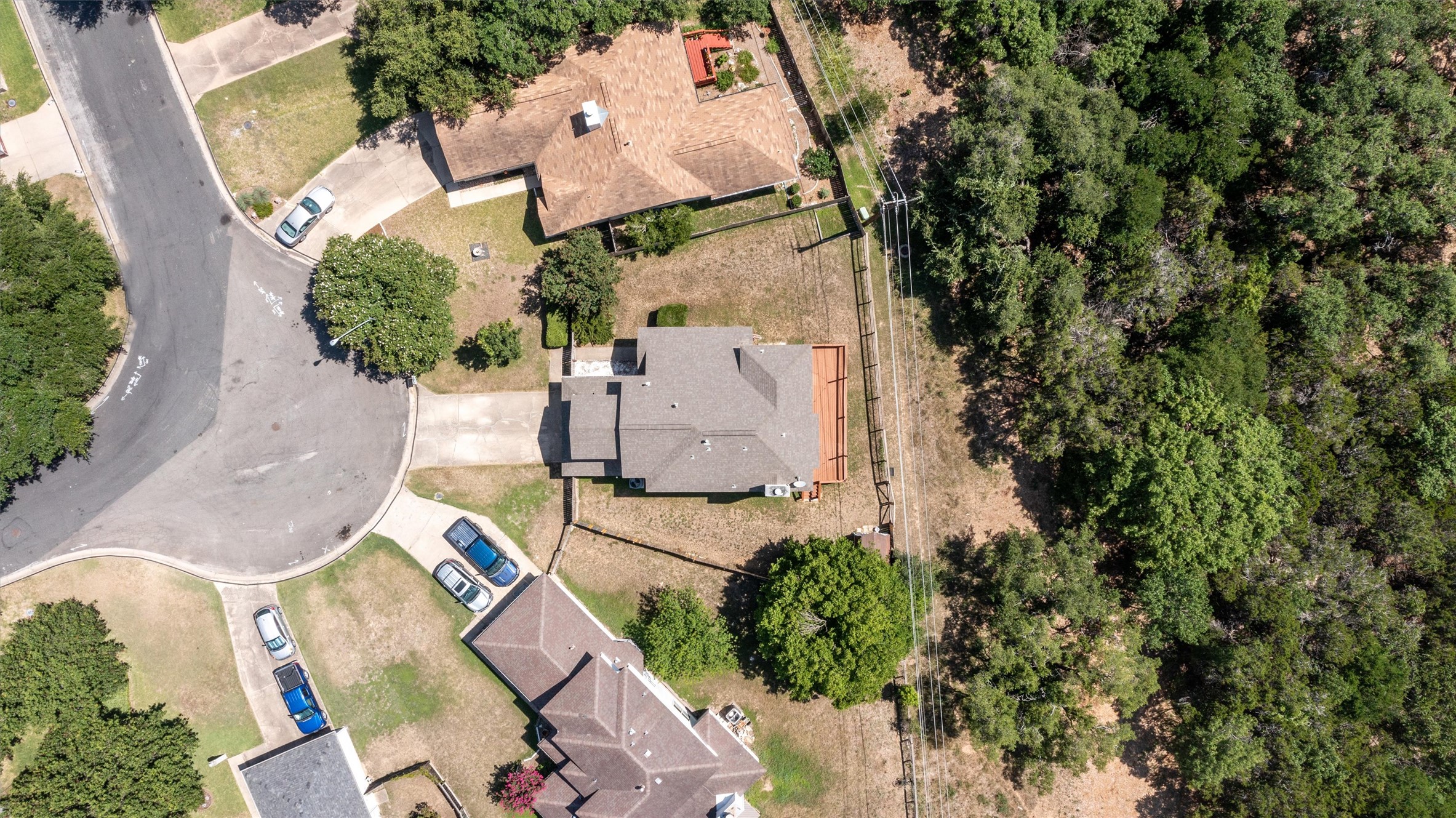 3011 Wadsworth Way Austin, TX 78748 - Photo 3 of 28 an aerial view of a house with a yard and tennis court