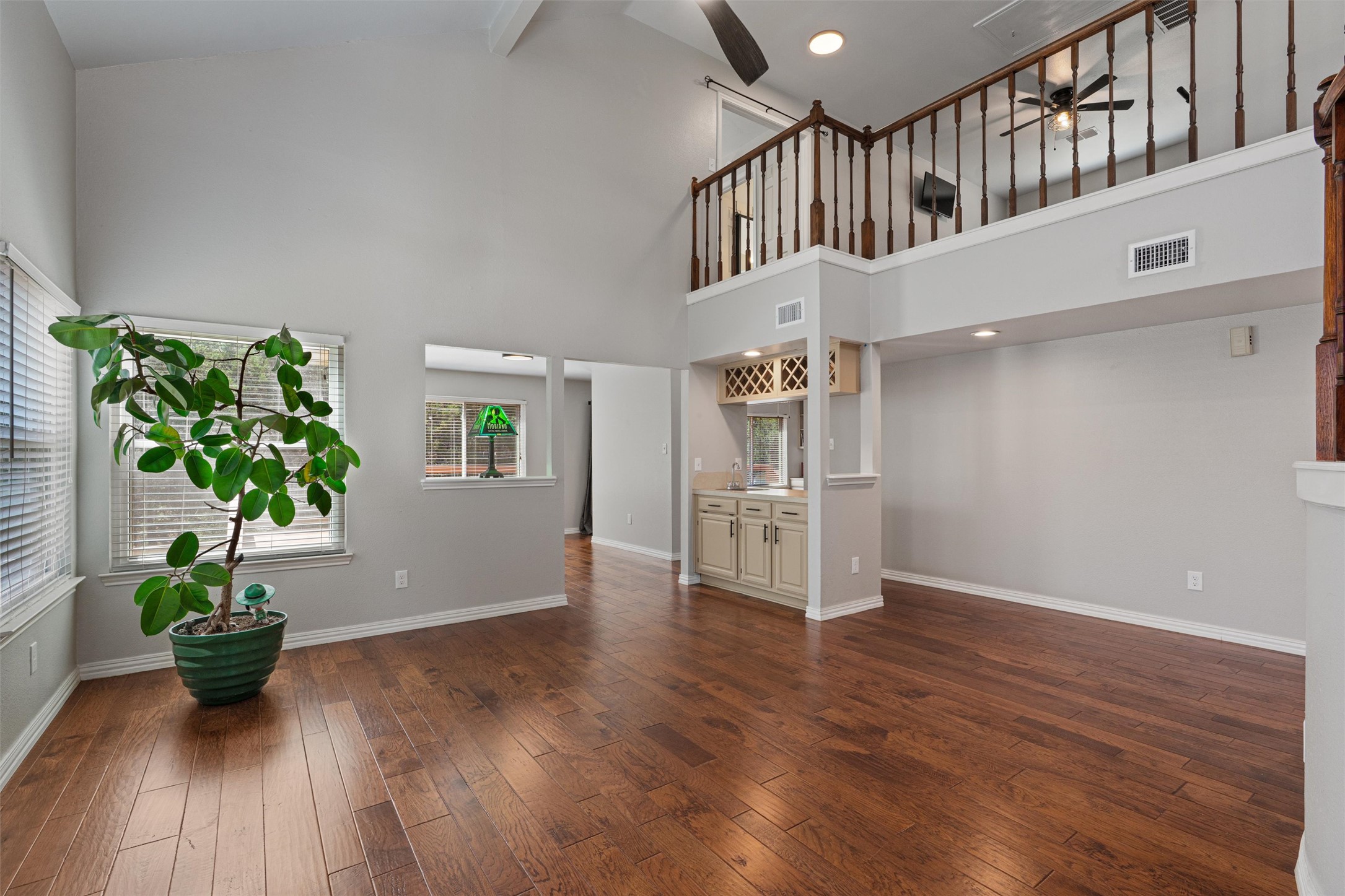 3011 Wadsworth Way Austin, TX 78748 - Photo 5 of 28 a view interior of a house with wooden floor and a potted plant