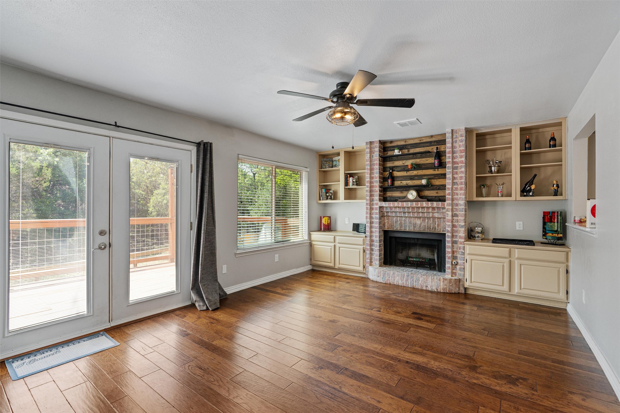3011 Wadsworth Way Austin, TX 78748 - Photo 9 of 28 a view of a livingroom with furniture a ceiling fan and wooden floor