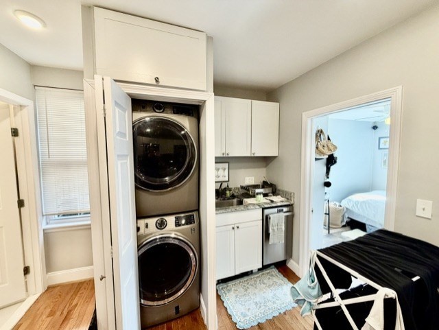 14 Cleveland Place, Unit 3 Boston, MA 02113 - Photo 3 of 22 a utility room with sink dryer and washer