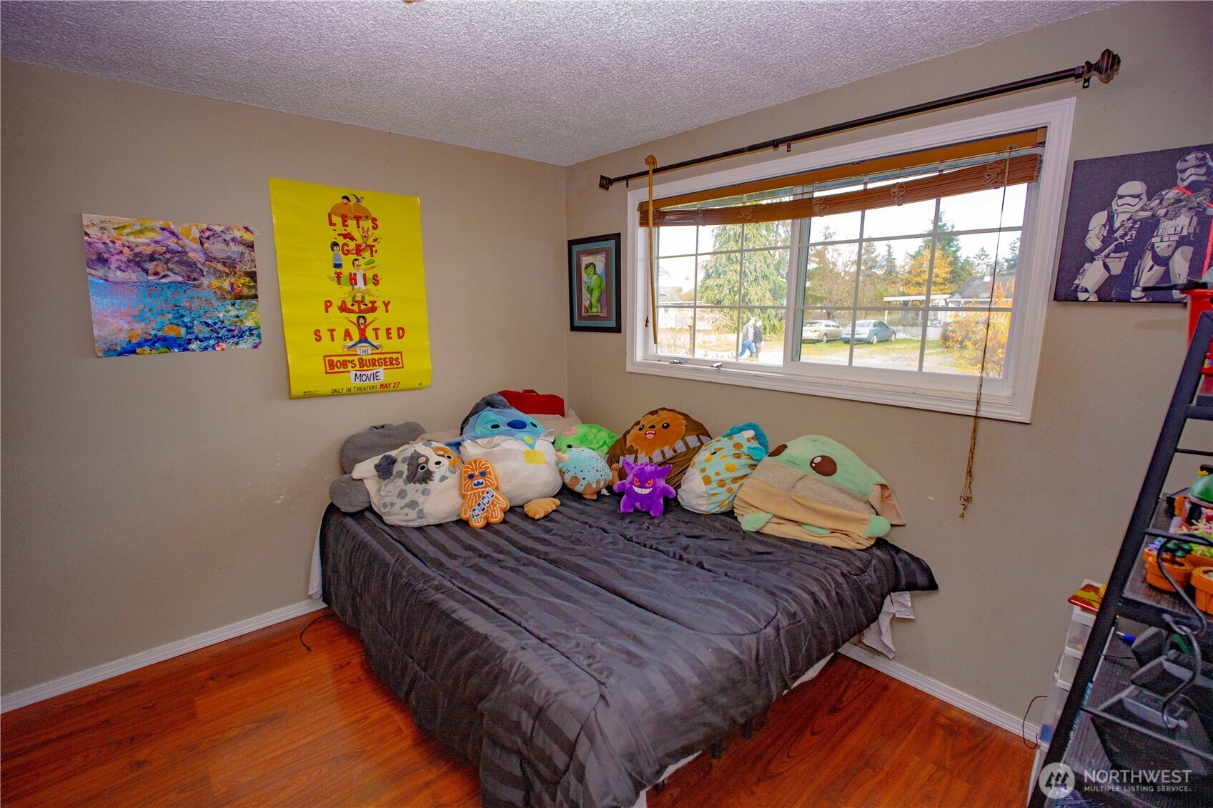 151 Valley View Drive Sequim, WA 98382 - Photo 29 of 40 a bedroom with a bed and a window
