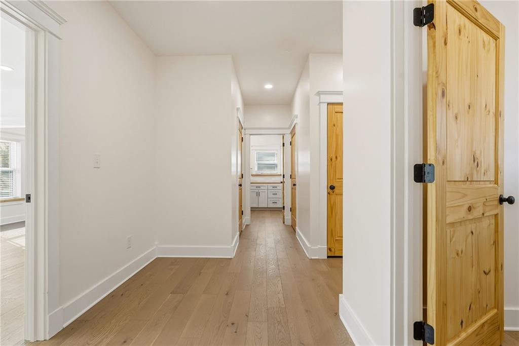 4844 Lucerne Road Indiana, PA 15701 - Photo 34 of 39 a view of a hallway with wooden floor and a bathroom