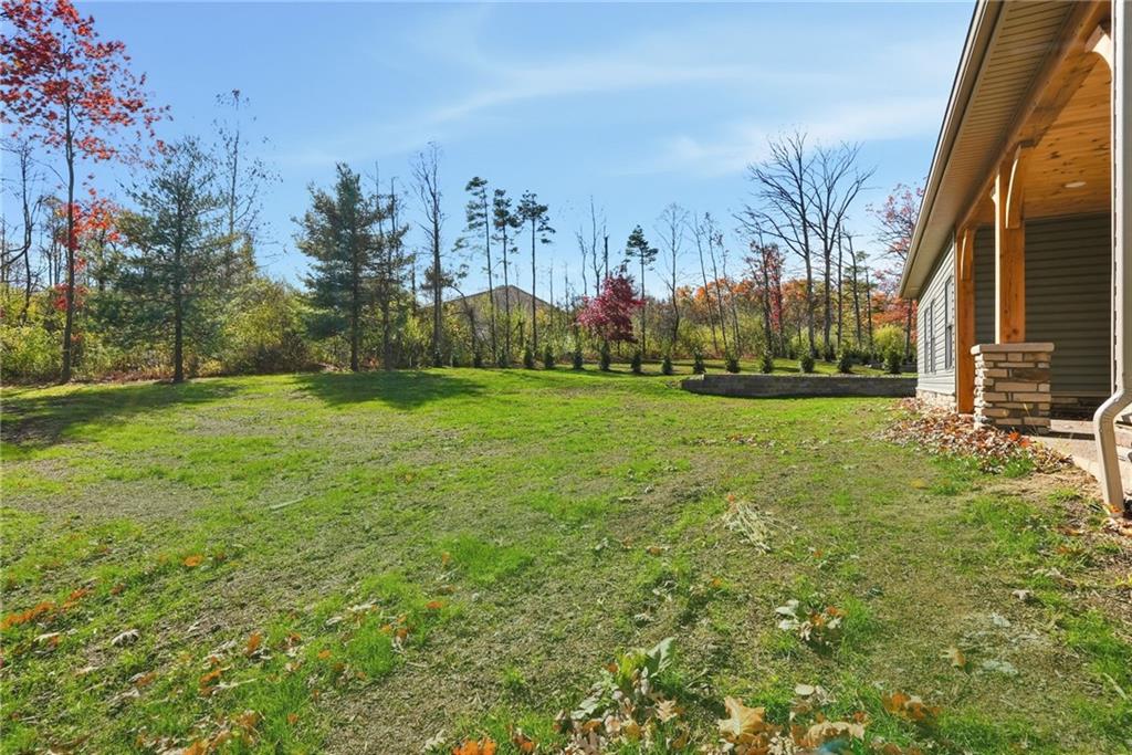 4844 Lucerne Road Indiana, PA 15701 - Photo 36 of 39 a view of a grassy field with trees in the background