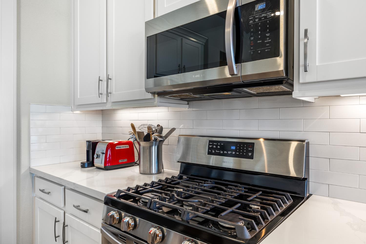 1661 Spring Street, Unit 433 Davis, CA 95616 - Photo 12 of 56 a stove top oven sitting inside of a kitchen