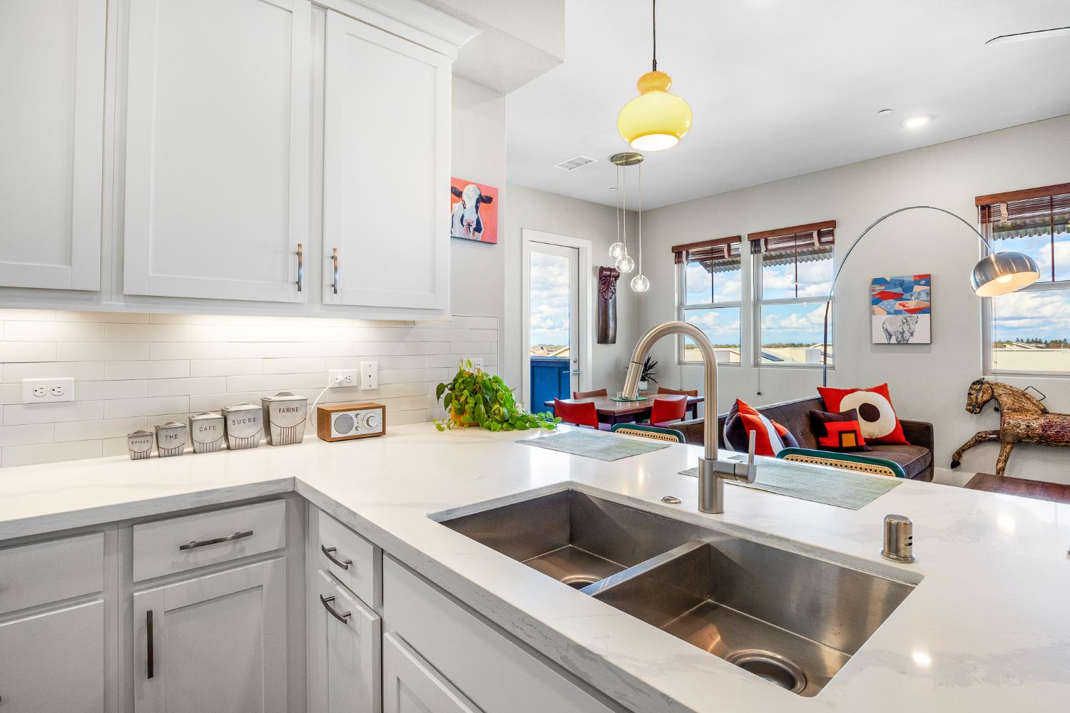 1661 Spring Street, Unit 433 Davis, CA 95616 - Photo 14 of 56 a kitchen with a sink cabinets and a window