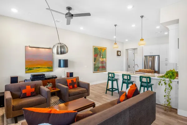 a living room with furniture and a table