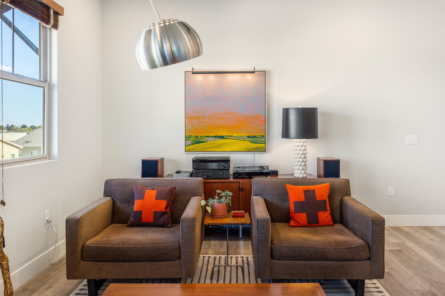 1661 Spring Street, Unit 433 Davis, CA 95616 - Photo 19 of 56 a living room with furniture and a flat screen tv