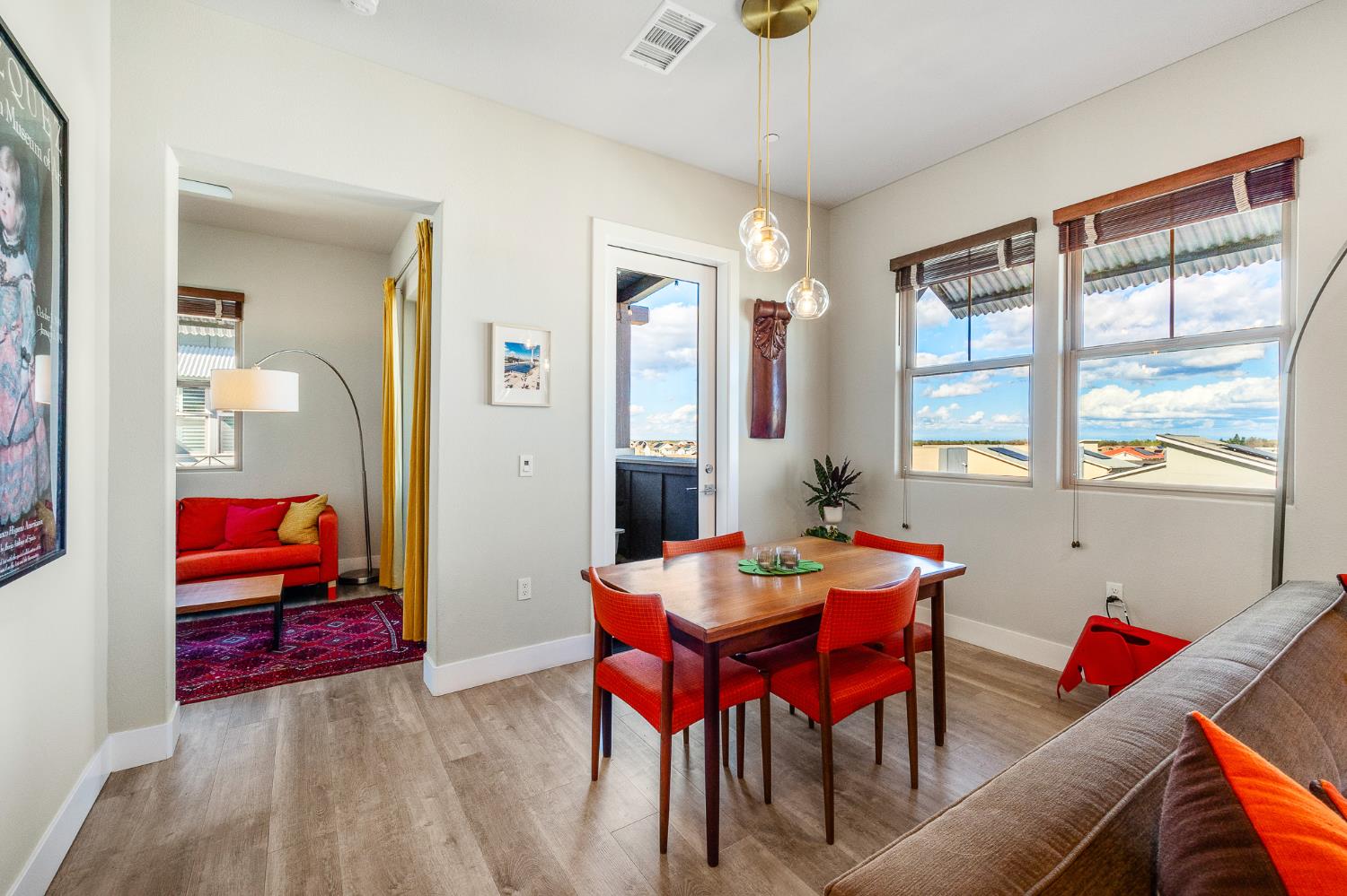 1661 Spring Street, Unit 433 Davis, CA 95616 - Photo 21 of 56 a view of a dining room with furniture window and wooden floor