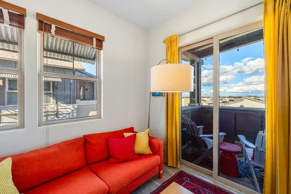 a bedroom with a bed furniture and a window