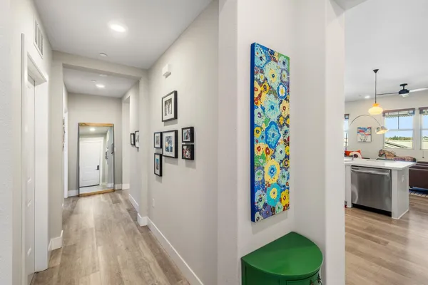 a room with a bed and a mirror