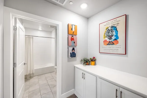 a workspace with furniture and book shelf