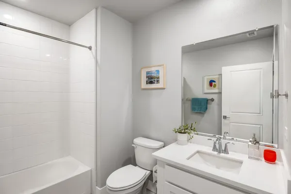 a view of a workspace with furniture