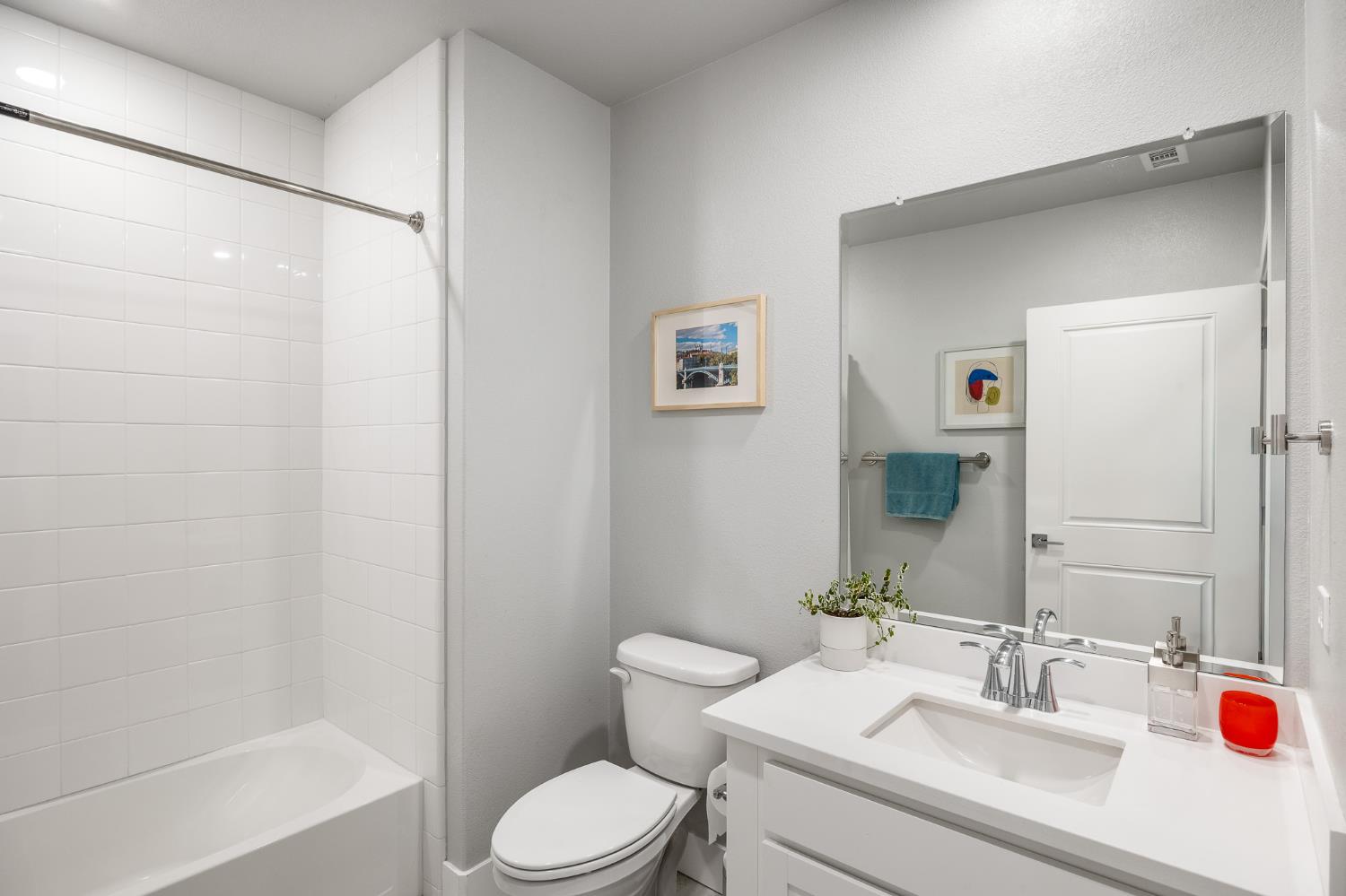 1661 Spring Street, Unit 433 Davis, CA 95616 - Photo 35 of 56 a bathroom with a sink toilet and shower