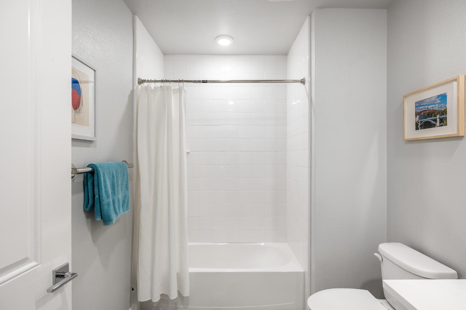 1661 Spring Street, Unit 433 Davis, CA 95616 - Photo 36 of 56 a bathroom with a shower a toilet and a sink