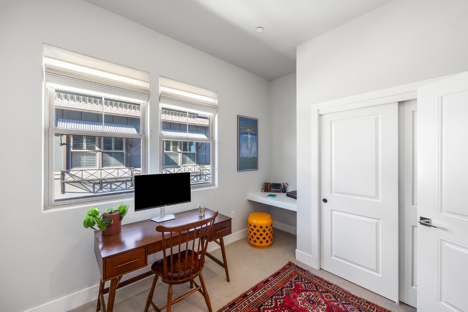 1661 Spring Street, Unit 433 Davis, CA 95616 - Photo 39 of 56 a view of a workspace with furniture