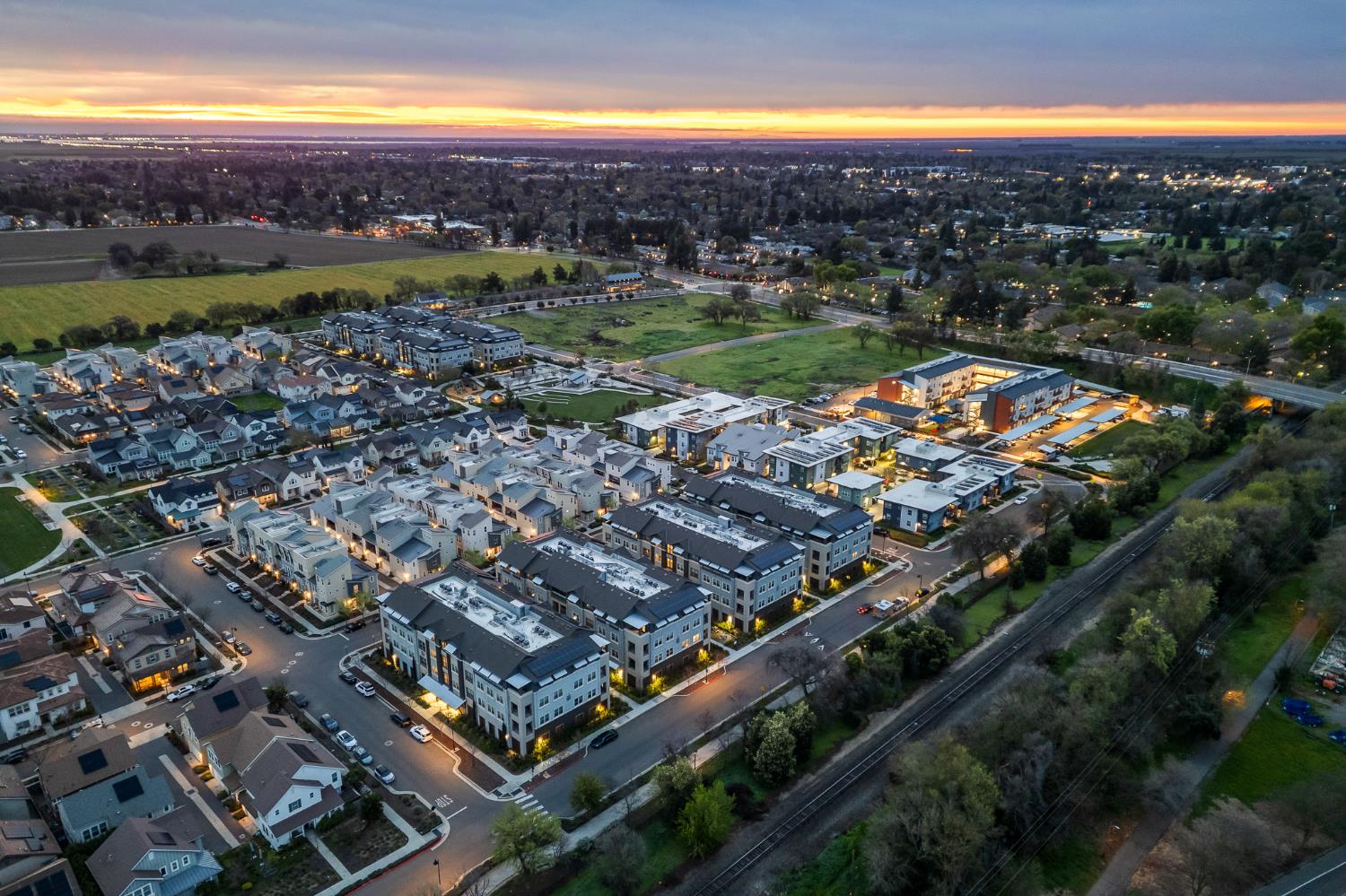 1661 Spring Street, Unit 433 Davis, CA 95616 - Photo 41 of 56 an aerial view of residential houses with outdoor space and mountain view in back