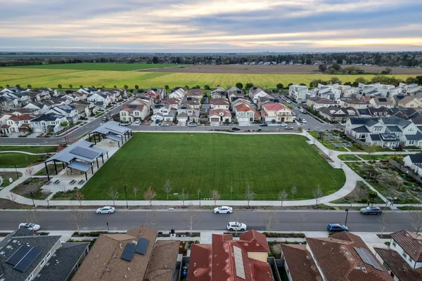 a view of a large body of water with a building in the background