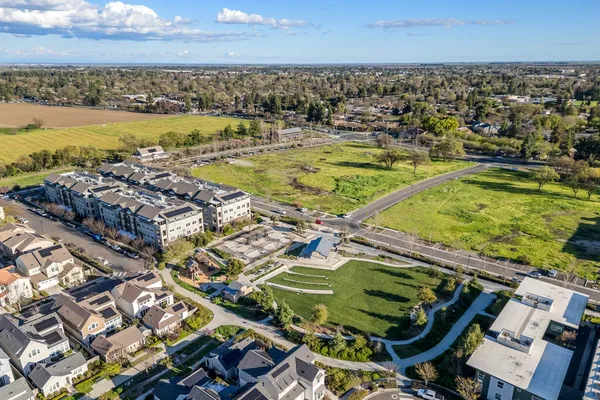 a view of a swimming pool with a chairs