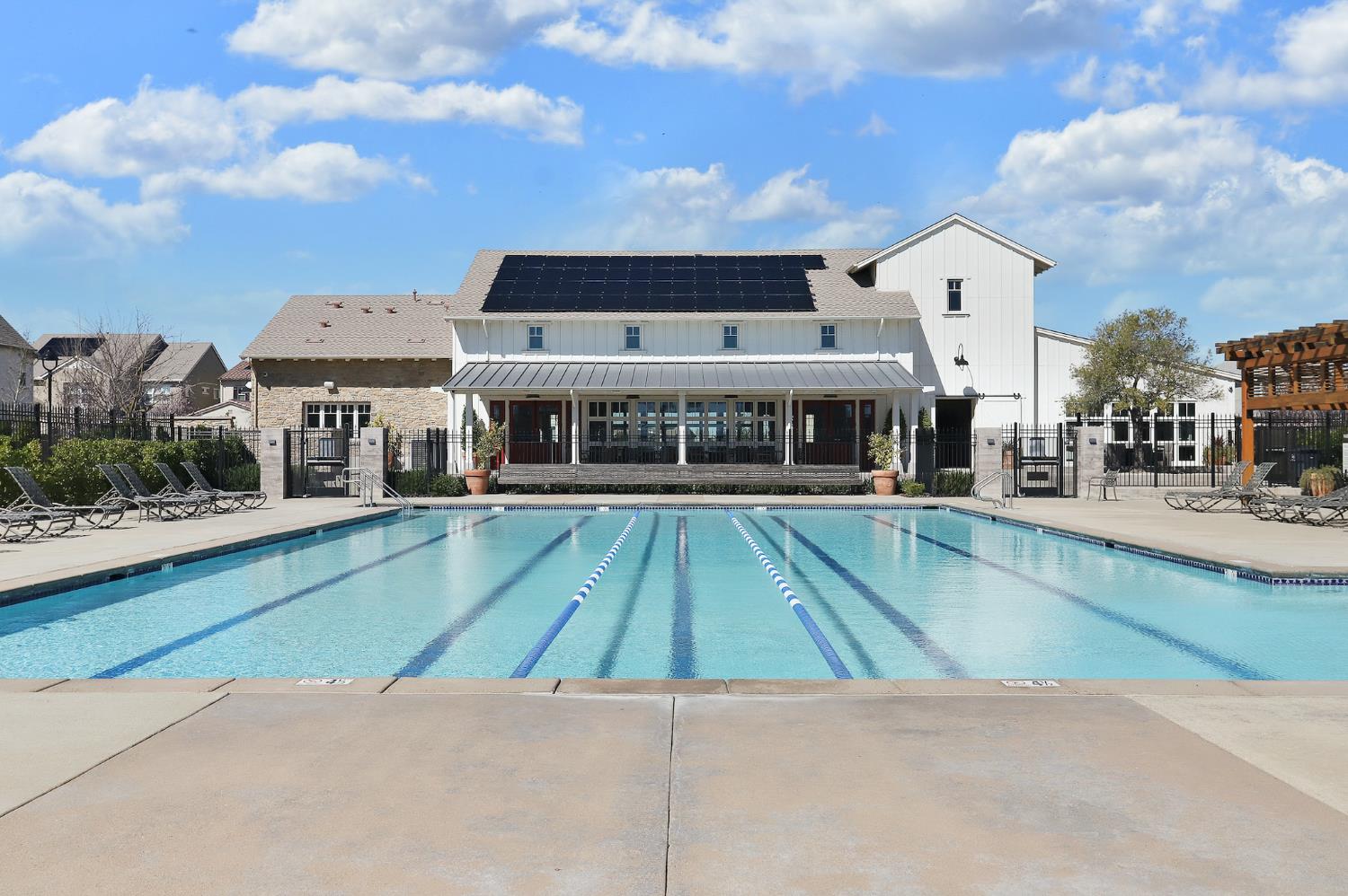 1661 Spring Street, Unit 433 Davis, CA 95616 - Photo 53 of 56 a view of a swimming pool with a chairs